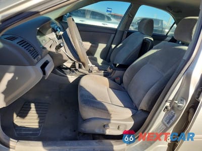 Zdjęcie 7 z 11 samochodu: 2003 TOYOTA CAMRY LE VIN:4T1BE32K13U179314 - miniatura