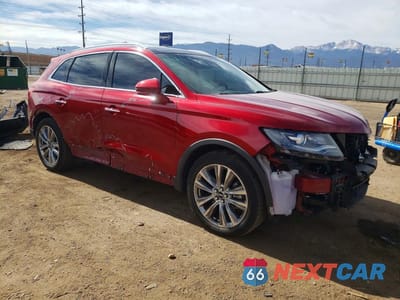 Czwarte zdjęcie samochodu z boku: 2016 LINCOLN MKX RESERVE VIN:2LMTJ8LP8GBL83499 - miniatura