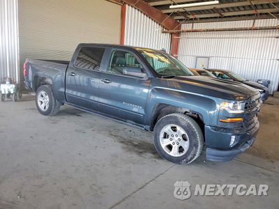 Czwarte zdjęcie samochodu z boku: 2018 CHEVROLET SILVERADO K1500 LT VIN:3GCUKREC5JG361241 - miniatura