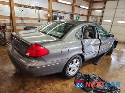 Trzecie zdjęcie samochodu z tyłu: 2003 FORD TAURUS SE VIN:1FAFP53U03A256385 - miniatura