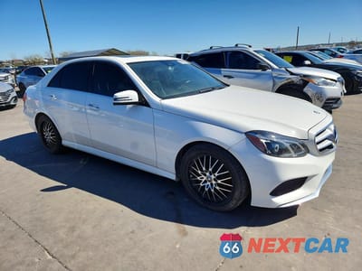 Czwarte zdjęcie samochodu z boku: 2014 MERCEDES-BENZ E 350 4MATIC VIN:WDDHF8JBXEA923965 - miniatura