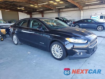 Czwarte zdjęcie samochodu z boku: 2015 FORD FUSION SE HYBRID VIN:3FA6P0LU9FR128448 - miniatura