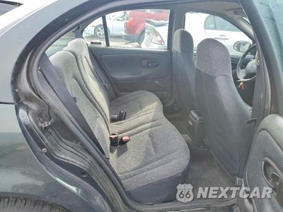 Zdjęcie 10 z 12 samochodu: 2000 SATURN SL1 VIN:1G8ZH5289YZ250113 - miniatura