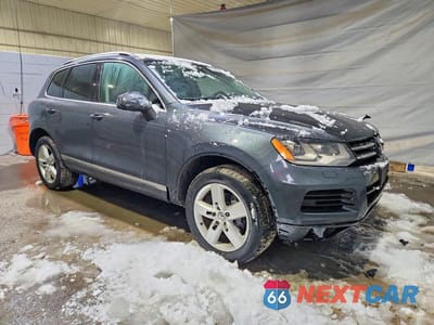 Czwarte zdjęcie samochodu z boku: 2012 VOLKSWAGEN TOUAREG V6 VIN:WVGFF9BP0CD002931 - miniatura