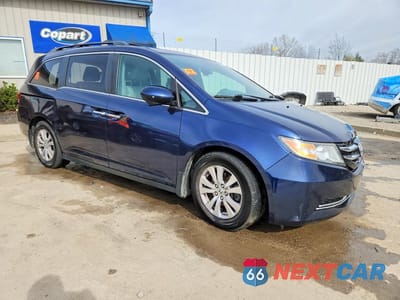 Czwarte zdjęcie samochodu z boku: 2014 HONDA ODYSSEY EXL VIN:5FNRL5H68EB049881 - miniatura