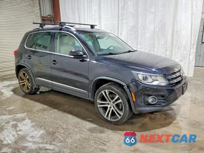 Czwarte zdjęcie samochodu z boku: 2017 VOLKSWAGEN TIGUAN SEL VIN:WVGWV7AXXHW505659 - miniatura
