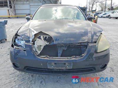 Piąte zdjęcie samochodu w środku: 2002 NISSAN ALTIMA 2.5 VIN:1N4AL11D52C192977 - miniatura