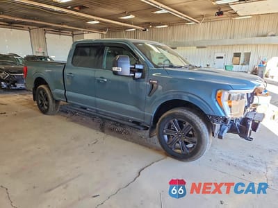 Czwarte zdjęcie samochodu z boku: 2023 FORD F150 VIN:1FTFW1E83PKD59872 - miniatura