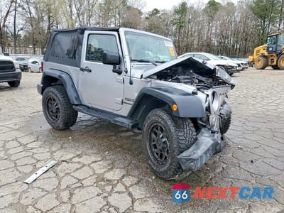 Czwarte zdjęcie samochodu z boku: 2017 JEEP WRANGLER SPORT VIN:1C4GJWAG1HL576703 - miniatura