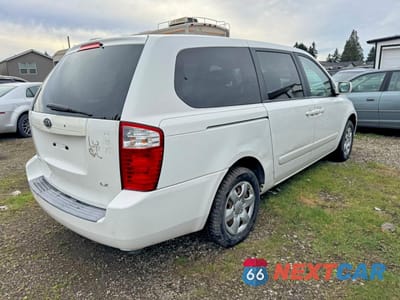 Czwarte zdjęcie samochodu z boku: 2006 KIA SEDONA LX VIN:KNDMB233766022936 - miniatura