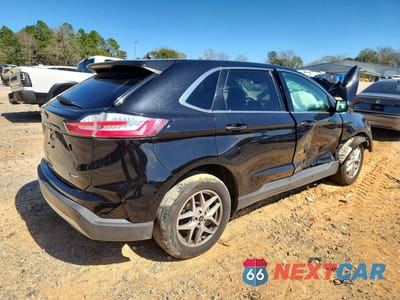 Trzecie zdjęcie samochodu z tyłu: 2023 FORD EDGE SEL VIN:2FMPK4J91PBA19108 - miniatura