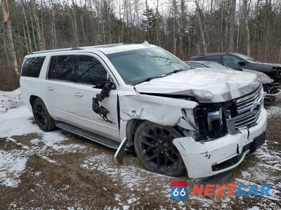 Czwarte zdjęcie samochodu z boku: 2017 CHEV SUBURBAN VIN:1GNSKJKCXHR244141 - miniatura