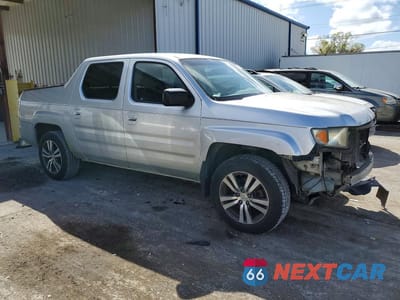 Czwarte zdjęcie samochodu z boku: 2008 HONDA RIDGELINE RTX VIN:2HJYK16348H509208 - miniatura