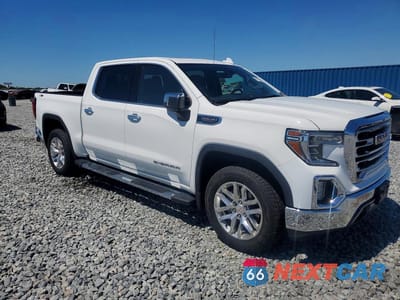Czwarte zdjęcie samochodu z boku: 2019 GMC SIERRA K1500 SLT VIN:3GTU9DED1KG239050 - miniatura