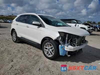 Czwarte zdjęcie samochodu z boku: 2021 FORD EDGE SEL VIN:2FMPK3J93MBA43836 - miniatura
