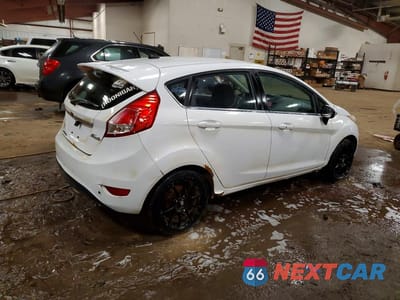 Trzecie zdjęcie samochodu z tyłu: 2014 FORD FIESTA TITANIUM VIN:3FADP4FJ9EM119356 - miniatura