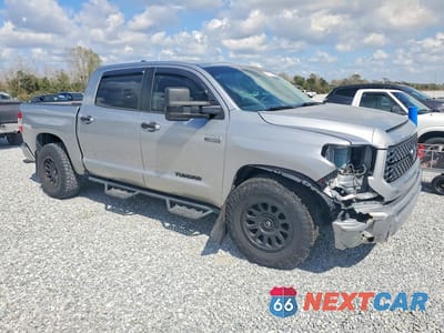 Czwarte zdjęcie samochodu z boku: 2020 TOYOTA TUNDRA PLATINUM VIN:5TFAY5F11LX890692 - miniatura