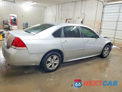 Trzecie zdjęcie samochodu z tyłu: 2013 CHEVROLET IMPALA LS VIN:2G1WF5E36D1260141 - miniatura