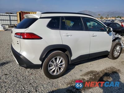 Trzecie zdjęcie samochodu z tyłu: 2022 TOYOTA COROLLA CROSS LE VIN:7MUCAABG7NV032514 - miniatura