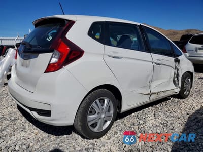 Trzecie zdjęcie samochodu z tyłu: 2020 HONDA FIT LX VIN:3HGGK5H48LM715883 - miniatura