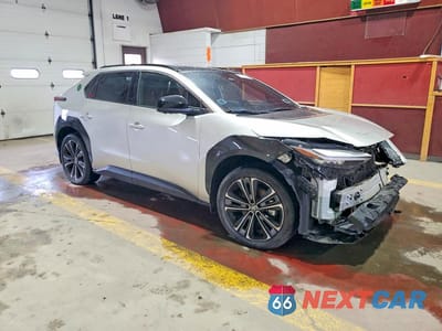 Czwarte zdjęcie samochodu z boku: 2023 TOYOTA BZ4X LIMITED VIN:JTMABACA4PA039025 - miniatura