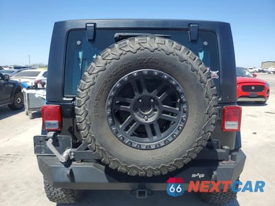 Zdjęcie 6 z 12 samochodu: 2010 JEEP WRANGLER SPORT VIN:1J4AA2D18AL228631 - miniatura