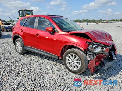 Czwarte zdjęcie samochodu z boku: 2014 MAZDA CX-5 TOURING VIN:JM3KE2CY4E0384371 - miniatura