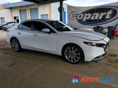 Czwarte zdjęcie samochodu z boku: 2021 MAZDA 3 SELECT VIN:3MZBPABL1MM200984 - miniatura