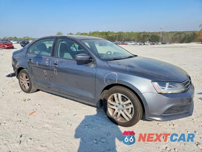 Czwarte zdjęcie samochodu z boku: 2018 VOLKSWAGEN JETTA S VIN:3VW2B7AJ1JM260387 - miniatura