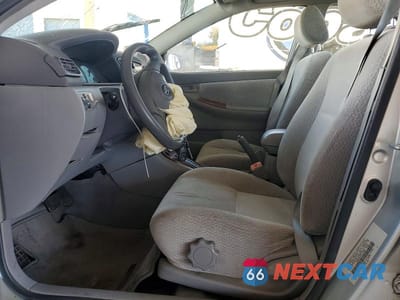 Zdjęcie 7 z 12 samochodu: 2004 TOYOTA COROLLA LE VIN:JTDBR32E842017857 - miniatura