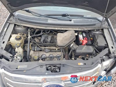 Zdjęcie 12 z 13 samochodu: 2010 FORD EDGE SEL VIN:2FMDK4JC0ABB34837 - miniatura