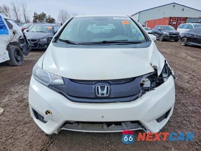 Piąte zdjęcie samochodu w środku: 2015 HONDA FIT LX VIN:3HGGK5H51FM105966 - miniatura