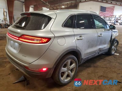 Trzecie zdjęcie samochodu z tyłu: 2017 LINCOLN MKC PREMIERE VIN:5LMCJ1C95HUL46911 - miniatura