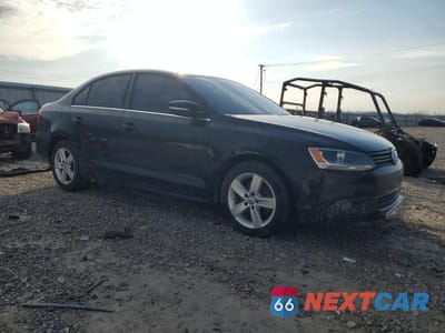 Czwarte zdjęcie samochodu z boku: 2012 VOLKSWAGEN JETTA TDI VIN:3VWLL7AJ0CM016475 - miniatura