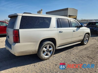 Trzecie zdjęcie samochodu z tyłu: 2015 CHEVROLET SUBURBAN K1500 LTZ VIN:1GNSKKKC1FR721655 - miniatura