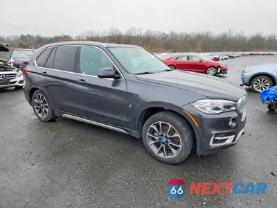 Czwarte zdjęcie samochodu z boku: 2018 BMW X5 XDR40E VIN:5UXKT0C55J0V98531 - miniatura