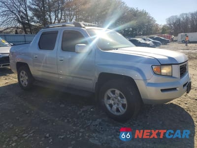 Czwarte zdjęcie samochodu z boku: 2006 HONDA RIDGELINE RTL VIN:2HJYK16566H557632 - miniatura