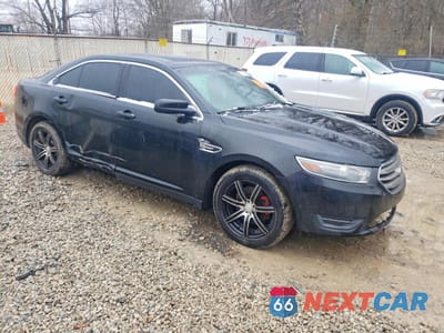 Czwarte zdjęcie samochodu z boku: 2013 FORD TAURUS SEL VIN:1FAHP2E84DG128334 - miniatura