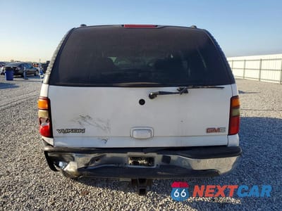 Zdjęcie 6 z 13 samochodu: 2003 GMC YUKON VIN:1GKEC13Z53R243305 - miniatura