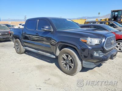 Czwarte zdjęcie samochodu z boku: 2019 TOYOTA TACOMA TRD SPORT VIN:3TMAZ5CNXKM107698 - miniatura