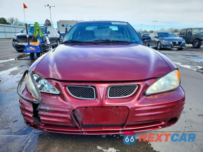 Piąte zdjęcie samochodu w środku: 2000 PONTIAC GRAND AM SE1 VIN:1G2NF52T4YC548316 - miniatura