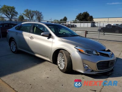 Czwarte zdjęcie samochodu z boku: 2014 TOYOTA AVALON HYBRID XLE TOURING VIN:4T1BD1EB4EU027761 - miniatura