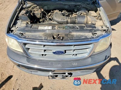 Zdjęcie 11 z 12 samochodu: 2001 FORD F-150 VIN:1FTRW07L81KA90283 - miniatura