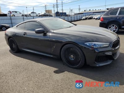 Czwarte zdjęcie samochodu z boku: 2022 BMW M850XI VIN:WBABC4C06NCH71538 - miniatura