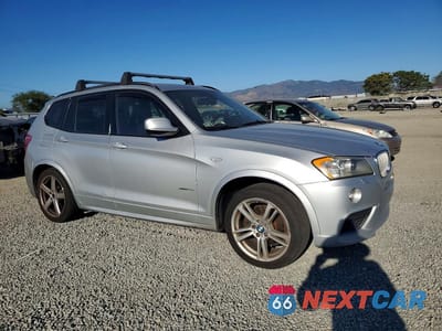 Czwarte zdjęcie samochodu z boku: 2014 BMW X3 VIN:5UXWX7C53E0E79335 - miniatura