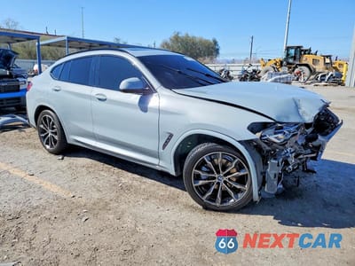 Czwarte zdjęcie samochodu z boku: 2022 BMW X4 XDRIVE30I VIN:5UX33DT05N9M50459 - miniatura
