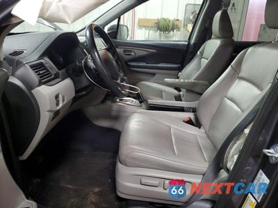 Zdjęcie 7 z 13 samochodu: 2021 HONDA PILOT EXL VIN:5FNYF6H5XMB066664 - miniatura