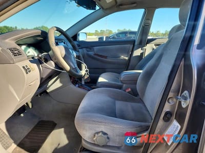 Zdjęcie 7 z 11 samochodu: 2003 TOYOTA COROLLA LE VIN:1NXBR32E63Z125747 - miniatura