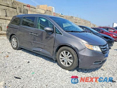 Czwarte zdjęcie samochodu z boku: 2016 HONDA ODYSSEY EXL VIN:5FNRL5H68GB145531 - miniatura