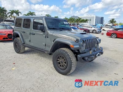 Czwarte zdjęcie samochodu z boku: 2021 JEEP WRANGLER UNLIMITED RUBICON 392 VIN:1C4JJXSJ7MW828615 - miniatura